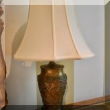 D14. Brass repousse table lamp. 